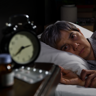 woman trying to fall asleep